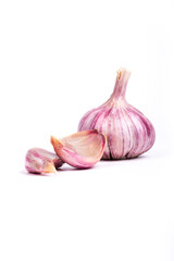 natural seasoning for the dish. garlic head and clove. on a white background. close-up