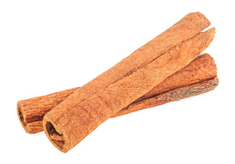 Two aromatic dried cinnamon sticks isolated on a white background. Cassia.
