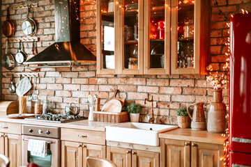 kitchen in authentic stylish chalet decorated for Christmas or New Year eve dinner, details of a...