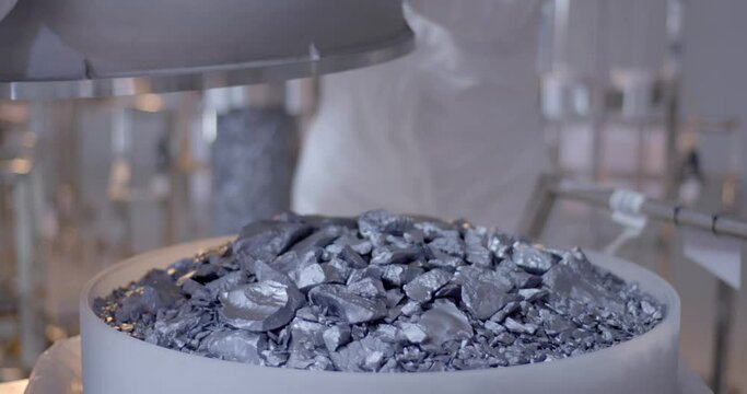 Silicon crystal and ingot used for solar panel cell is taken to processing. Factory that produces panels for solar energy. Clean energy. Raw material