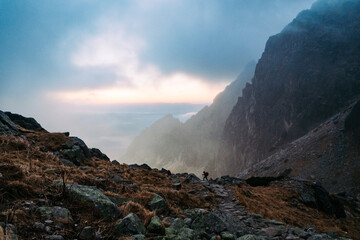 Tiny hiker silhouette in big Tatra mountains