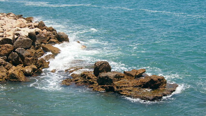 Scenic colorful  sea coast. Good for wallpaper or background image Radiant sea beach Panoramic photo . Sea rocks beach. Wave