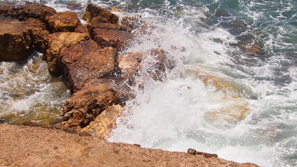 Scenic colorful  sea coast. Good for wallpaper or background image Radiant sea beach Panoramic photo . Sea rocks beach. Wave