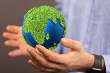 Ecology concept of green Earth globe made of leaves