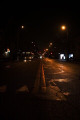 Fototapeta premium Night road with reflection from the lights