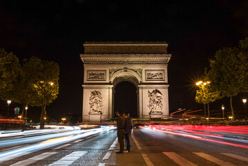 Nightly traffic on the Champs-Elysees, Arc de Triomph in the background