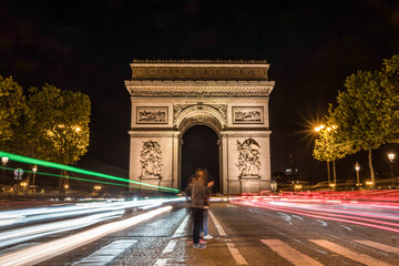 Nightly traffic on the Champs-Elysees, Arc de Triomph in the background