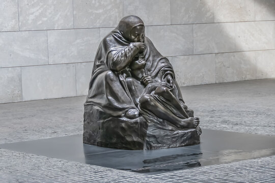 Mother and her dead son monument (by Kathe Kollwitz) in Neue Wache memorial (1818) on Unter den Linden. Memorial - main memorial site for victims of war and tyranny. BERLIN, GERMANY. AUGUST 20, 2019.