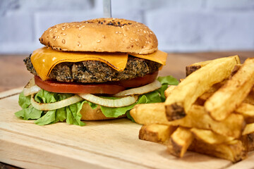 burger with Cheese and lettuce with fries, vegetarian and meat