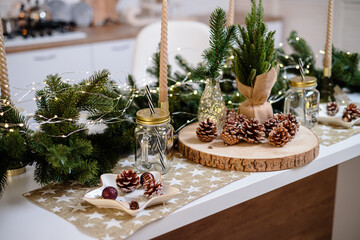 Christmas tree in the house New Year's interior in the kitchen. Decorated Christmas photo zone