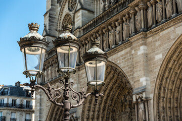 Fototapeta na wymiar Antique Street Light in front of the Notre Dame Cathedral in Paris