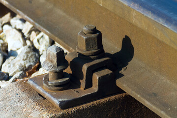 A loose rail bolt that represents potential hazard. 
Adobe RGB color space.