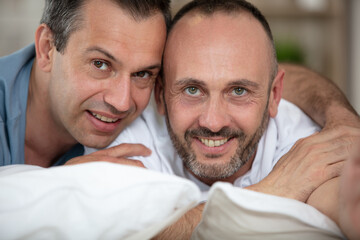 portrait of happy male gay couple in love