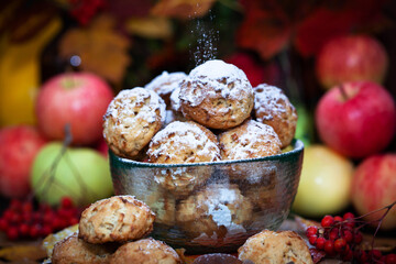 Homemade delicious apple cookies on rustic autumn background