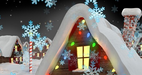 Digitally generated image of illuminated decorated house with snowflakes at night