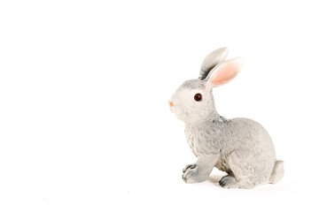figurine of a hare on a white background. Easter minimalistic concept