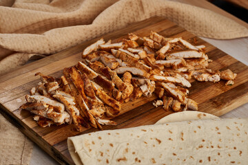 Chicken breast sliced for fajitas