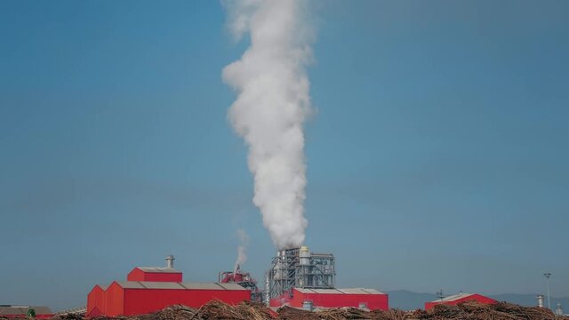 Factory pumping out smoke and steam. 
