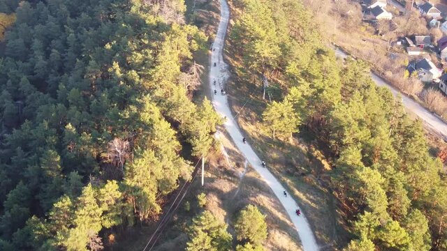 Motorcyclists go down the mountain road