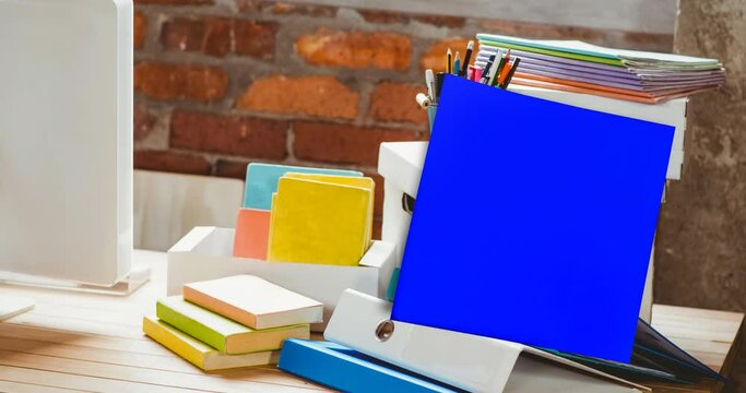 Animation of memo note with copy space over stationery items on desk - Powered by Adobe