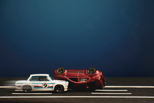 Small vehicles describing a traffic accident due to excessive speed and wrong overtaking or violation of rules