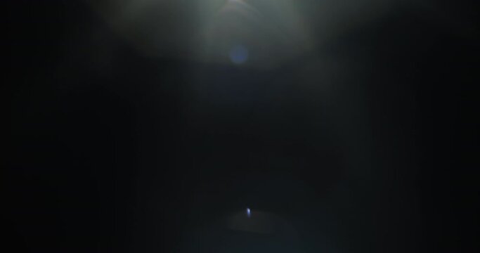 4K Pack of 4 optical lens flares transitions and overlays. Smooth transition to black background. Slow motion. 