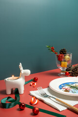Christmas mood table setting on red background