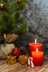 Obraz na płótnie Canvas Christmas tree, gift boxes and candles