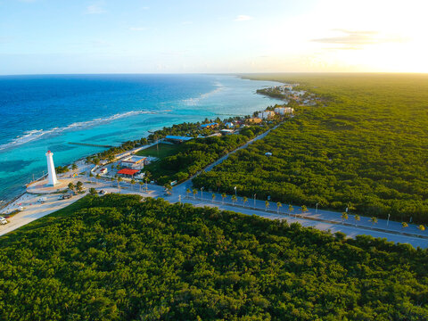 Mahahual Town view from the air in a sunset seen the caribbean colors of the sea