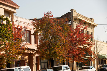 Oroville, California, USA - November 23, 2021: Late afternoon sun shines on historic downtown...