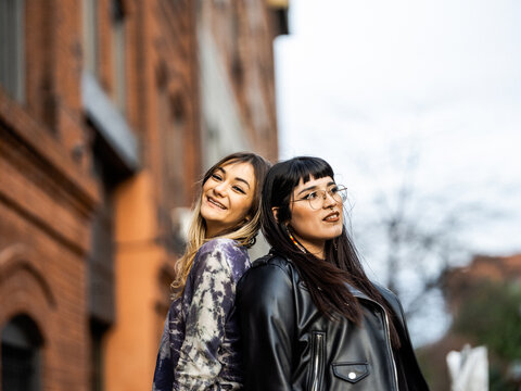Young Indigenous friends hanging out outdoors