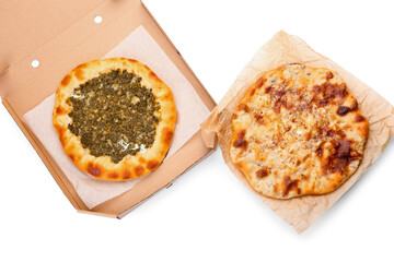 Different tasty khachapuri on white background