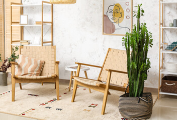Interior of stylish living room with cactus