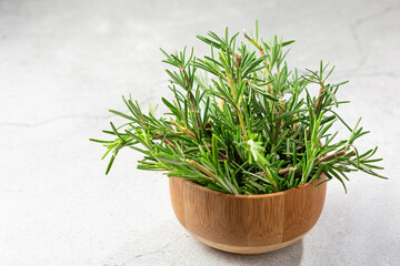 Fresh rosemary herb on the table.