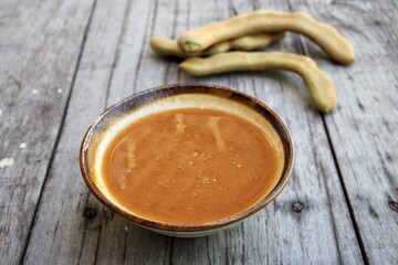 Tamarind sauce on old brown background