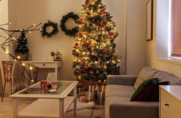 Interior of stylish living room decorated for Christmas