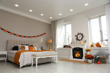 Modern bedroom decorated for Halloween. Festive interior