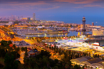 Obraz premium Aerial view of the evening city of Barcelona, the capital of the autonomous region of Catalonia, Spain