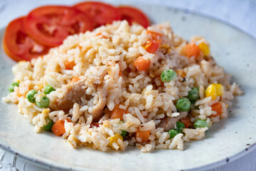 Fried rice with mixed vegetables and pork, top view