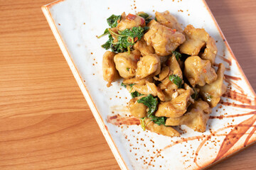 Stir-fried fish balls with basil, handmade in traditional Thai style