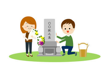 Obraz premium お墓参りに来た夫婦（秋冬）