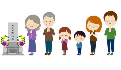 お墓参りをする家族（秋冬）