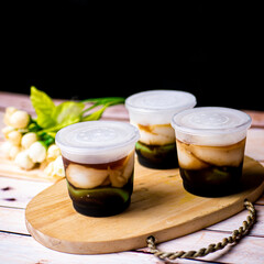 Lapis or Bubur Jongkong Indonesia's sweet porridge of rice flour, coconut milk and palm sugar syrup