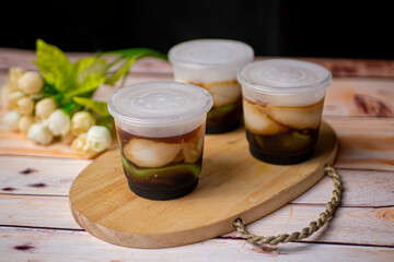 Lapis or Bubur Jongkong Indonesia's sweet porridge of rice flour, coconut milk and palm sugar syrup