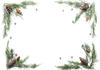 Frame made of coniferous branches and cones on white background