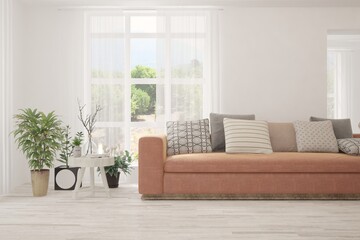 Stylish room in white color with sofa and summer landscape in window. Scandinavian interior design. 3D illustration