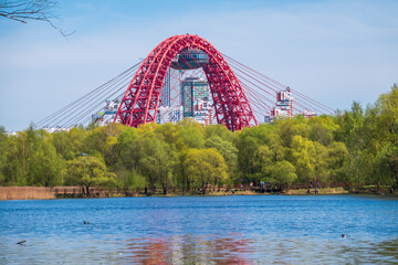 Green Russian nature in spring Moscow. View of the Zhivopisny Bridge from Serebryany Bor.