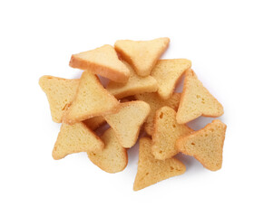Pile of delicious crispy rusks on white background, top view