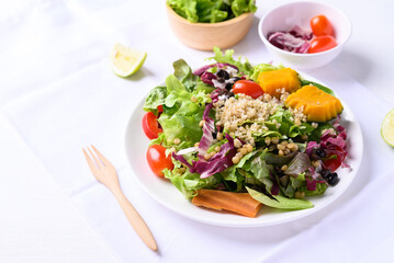Fresh organic vegetables with quinoa salad on white background ready to eating, Healthy Vegan food