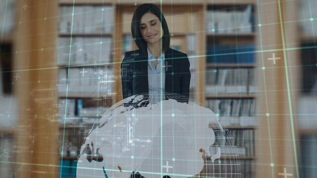Animation of data processing and globe spinning over businesswoman using interactive tablet